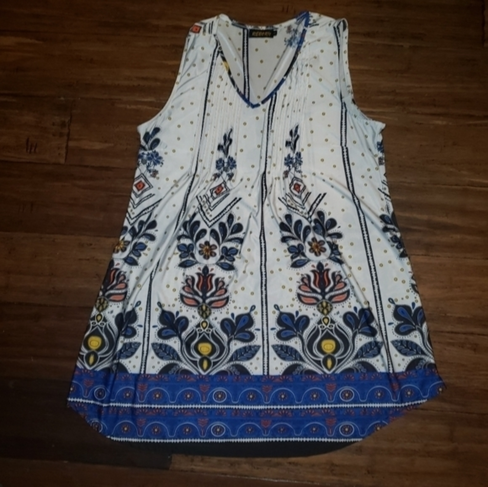 REBORN‎ sleeveless tunic.